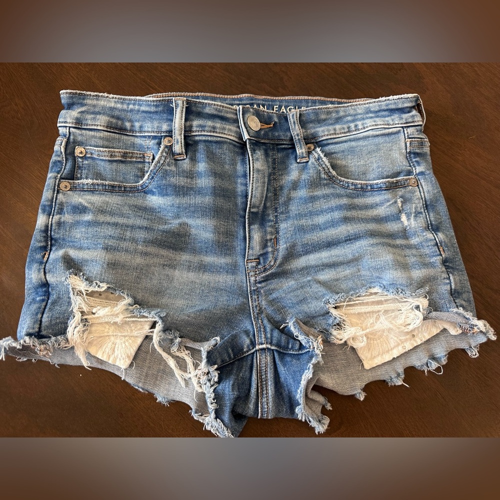 American Eagle Denim Distressed Women Shorts, exposed pocket size 8